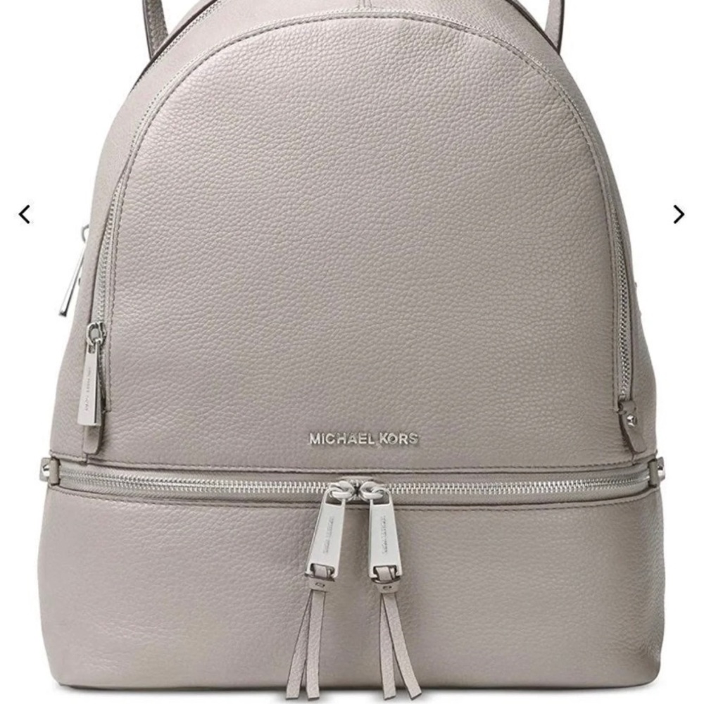 This is a new Michael kors rhea backpack !